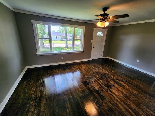 306 Johnson St, Lawrenceburg, TN 38464 - foyer entrance featuring dark wood-style flooring, a ceiling fan, crown molding, and baseboards