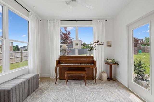 sitting room featuring baseboards