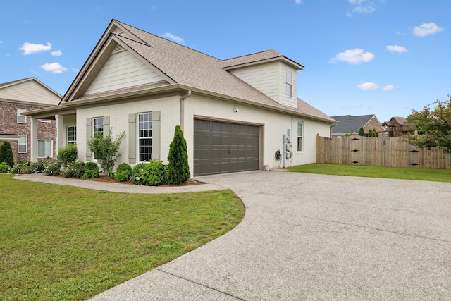 view of side of home with a garage, concrete driveway, and a shingled roof