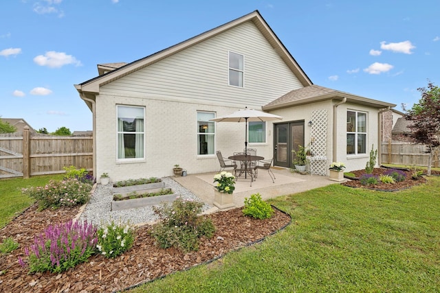 rear view of house with a patio area