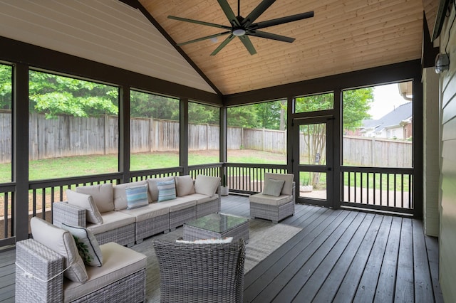 sunroom / solarium featuring a ceiling fan, lofted ceiling, and outdoor lounge area