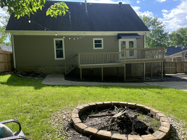 1508 Cedardale Rd, Mount Juliet, TN 37122 - rear view of house with an outdoor fire pit, a wooden deck, and a shingled roof