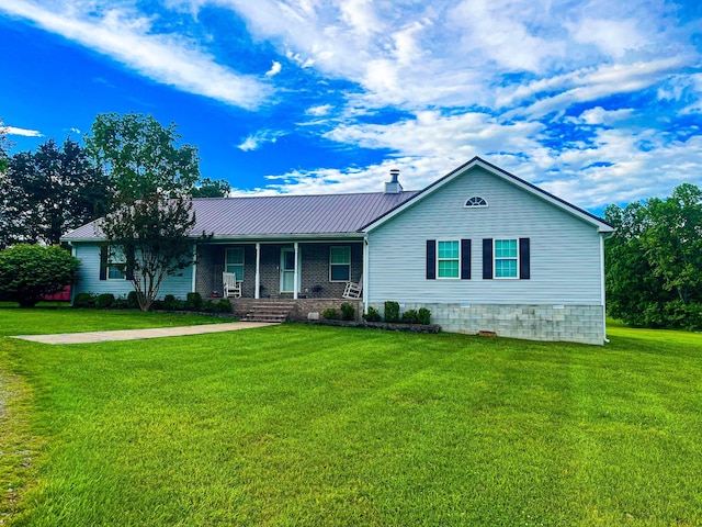 3517 Dobbins Pike, Portland, TN 37148 - view of front of property featuring covered porch, a front lawn, and metal roof