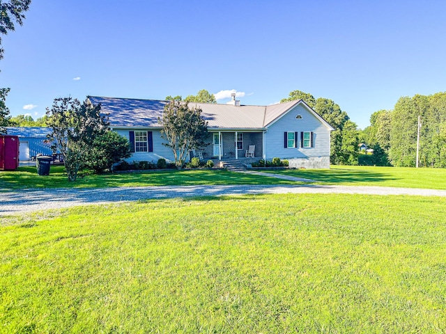 3517 Dobbins Pike, Portland, TN 37148 - ranch-style home with a front yard and metal roof