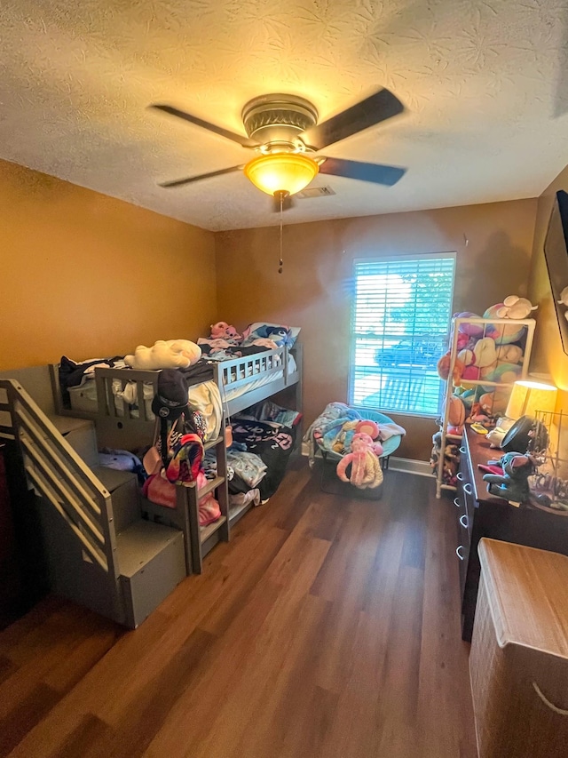 3517 Dobbins Pike, Portland, TN 37148 - bedroom with a textured ceiling, wood finished floors, and a ceiling fan