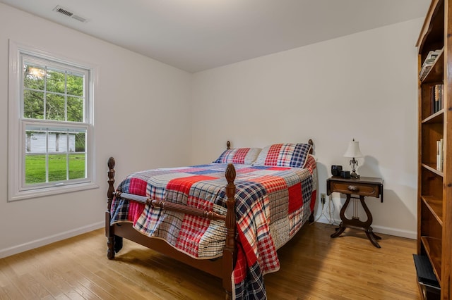 4060 Carters Creek Pike, Franklin, TN 37064 - bedroom with baseboards and wood finished floors