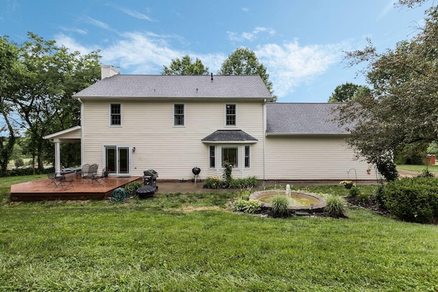 4060 Carters Creek Pike, Franklin, TN 37064 - back of property with a yard, a deck, a chimney, and a shingled roof