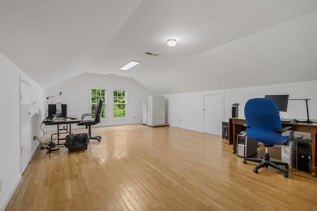 4060 Carters Creek Pike, Franklin, TN 37064 - home office with light wood-style flooring, lofted ceiling, and baseboards