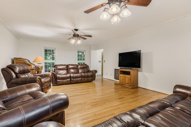 4060 Carters Creek Pike, Franklin, TN 37064 - living room featuring ceiling fan, light wood-style floors, crown molding, and baseboards