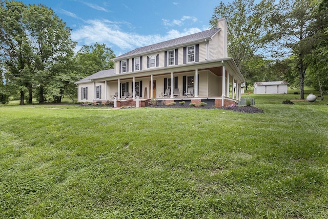 4060 Carters Creek Pike, Franklin, TN 37064 - farmhouse featuring a porch, a chimney, and a front yard