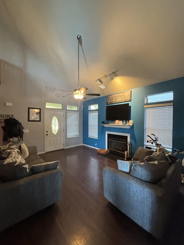 5929 Colchester Dr E, Hermitage, TN 37076 - living room with vaulted ceiling, wood finished floors, a fireplace, a ceiling fan, and baseboards