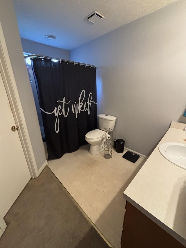 5929 Colchester Dr E, Hermitage, TN 37076 - full bathroom featuring vanity, toilet, and a shower with shower curtain