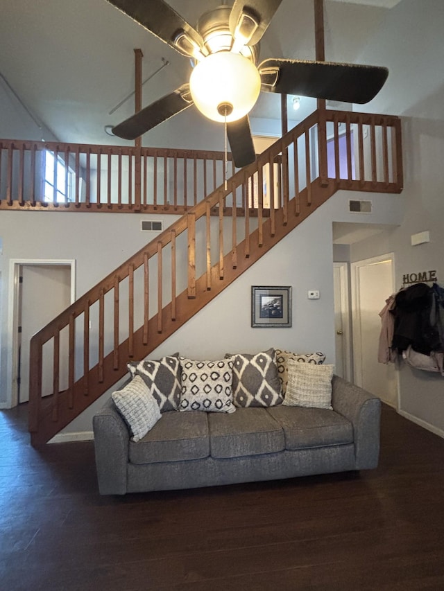 5929 Colchester Dr E, Hermitage, TN 37076 - living area featuring ceiling fan, wood finished floors, stairway, and baseboards