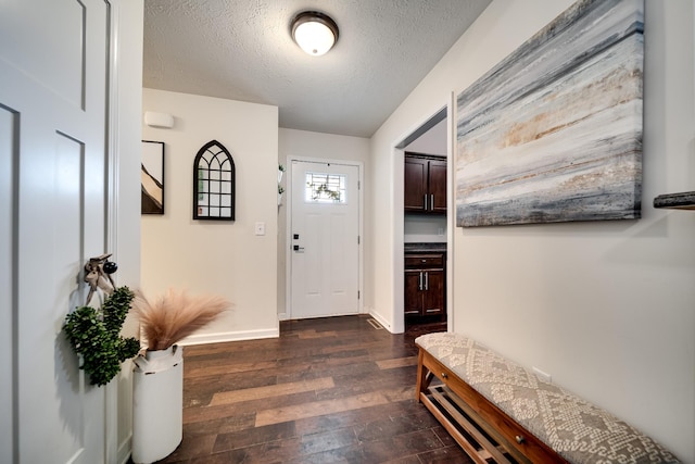 107 Tanesha Ct, Portland, TN 37148 - mudroom featuring dark wood-type flooring, a textured ceiling, and baseboards