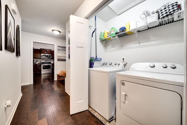107 Tanesha Ct, Portland, TN 37148 - laundry room with independent washer and dryer, dark wood finished floors, baseboards, and a textured ceiling