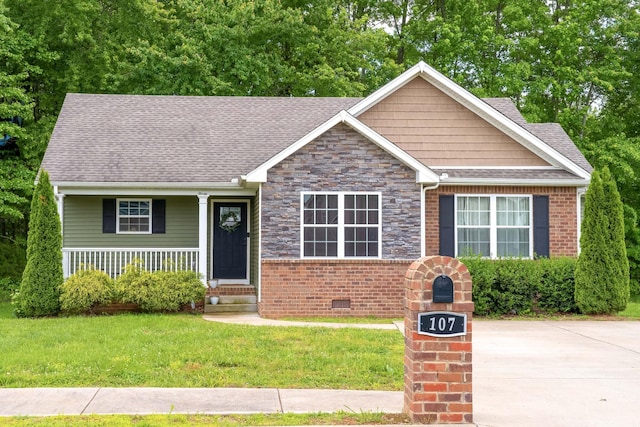 107 Tanesha Ct, Portland, TN 37148 - view of front of property featuring a front lawn, roof with shingles, crawl space, covered porch, and stone siding