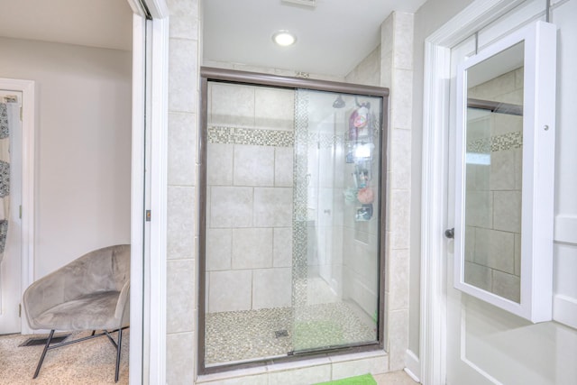 full bathroom with a shower stall and recessed lighting