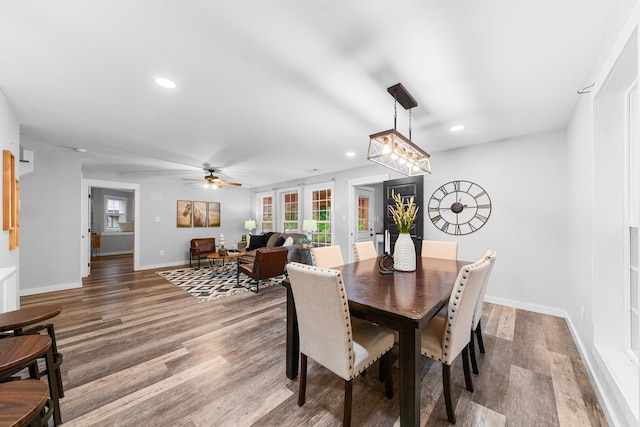 dining room featuring recessed lighting, wood finished floors, ceiling fan, and baseboards