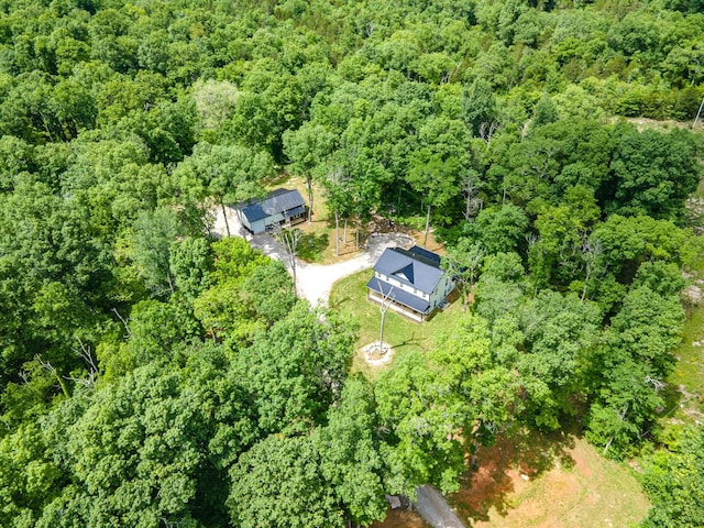 view from above of property with a forest