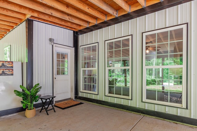 entrance to property with a patio