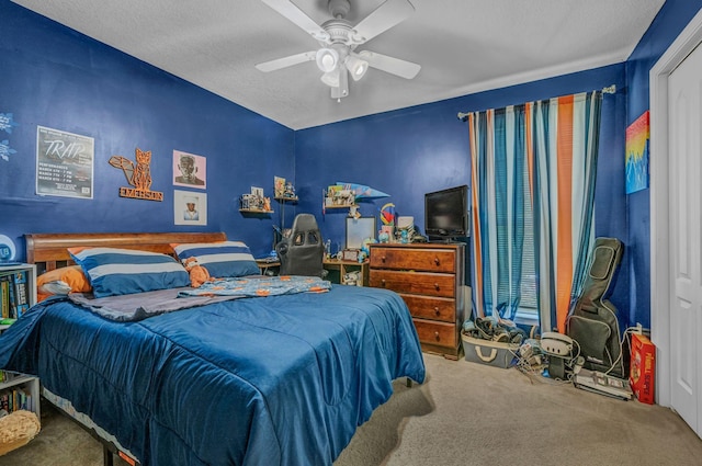 bedroom with carpet flooring and a ceiling fan