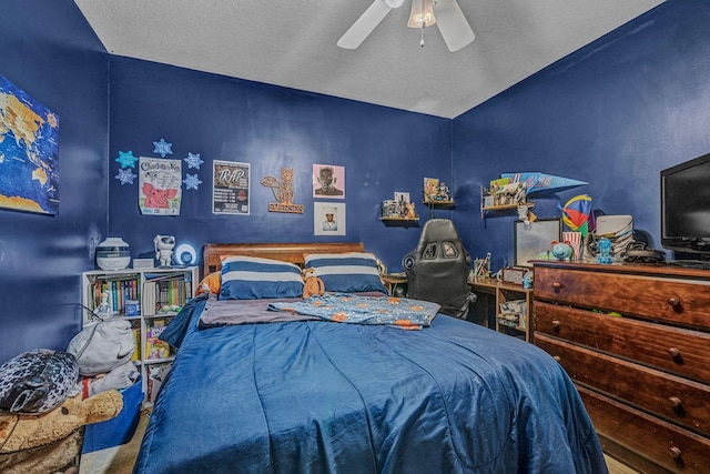 bedroom featuring a textured ceiling and ceiling fan