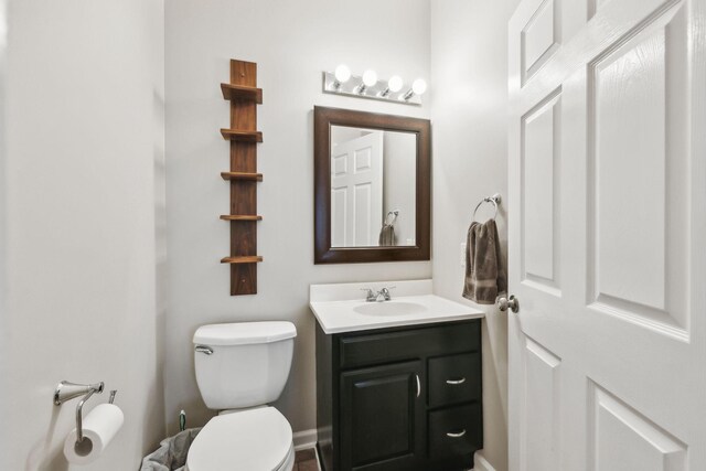 half bath with toilet and vanity