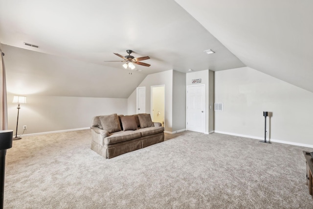 living area with carpet floors, a ceiling fan, lofted ceiling, and baseboards