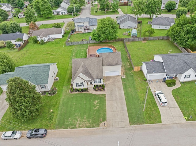 aerial perspective of suburban area with a pool