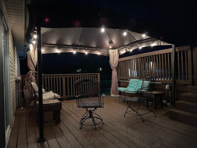 view of deck at night
