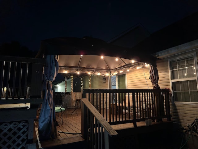 view of deck at twilight