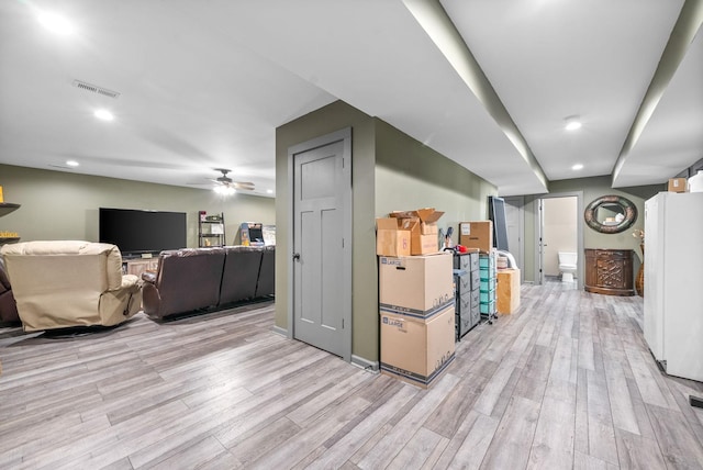 996 Gratton Rd, Clarksville, TN 37043 - below grade area featuring freestanding refrigerator, light wood-style flooring, ceiling fan, and recessed lighting
