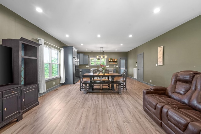 996 Gratton Rd, Clarksville, TN 37043 - dining space featuring light wood finished floors, recessed lighting, baseboards, and a chandelier