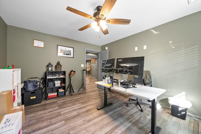 996 Gratton Rd, Clarksville, TN 37043 - office area with light wood finished floors, a ceiling fan, and baseboards