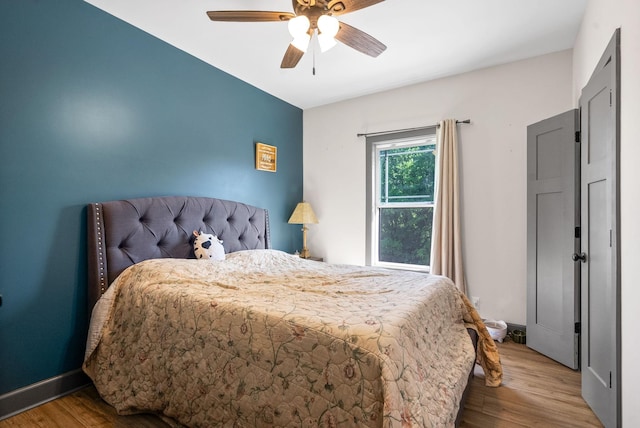 996 Gratton Rd, Clarksville, TN 37043 - bedroom with wood finished floors and a ceiling fan
