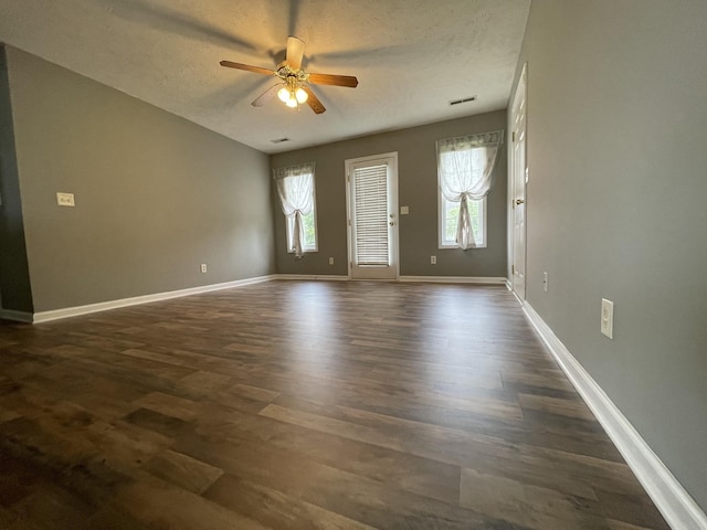 9104 Eddystone Ct, Smyrna, TN 37167 - empty room with a ceiling fan, dark wood finished floors, baseboards, and a textured ceiling