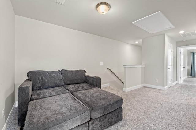 living area with carpet, baseboards, and recessed lighting