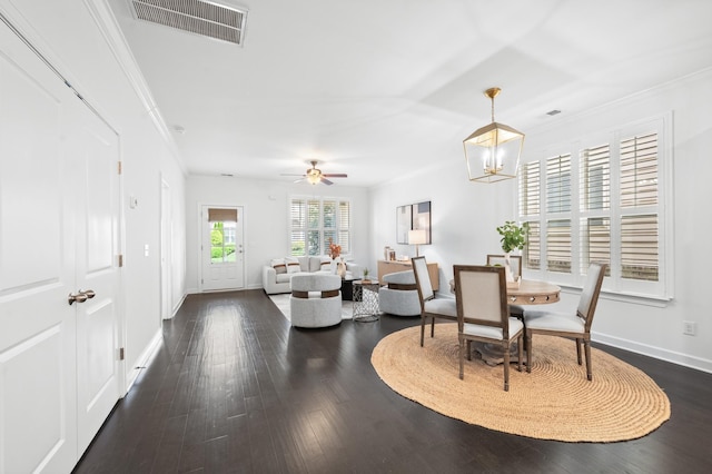 4085 Liberton Way, Nolensville, TN 37135 - dining room featuring baseboards, crown molding, dark wood-type flooring, ceiling fan, and a chandelier