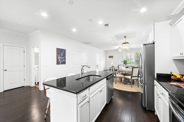 4085 Liberton Way, Nolensville, TN 37135 - kitchen featuring a sink, appliances with stainless steel finishes, dark wood-style floors, white cabinets, and ornamental molding