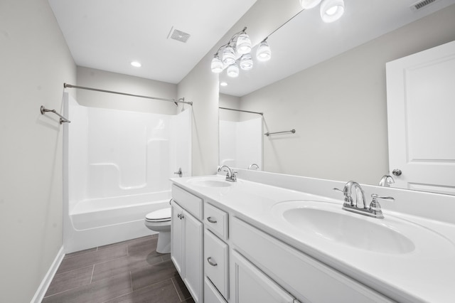 4085 Liberton Way, Nolensville, TN 37135 - bathroom featuring toilet, double vanity, recessed lighting, bathtub / shower combination, and baseboards