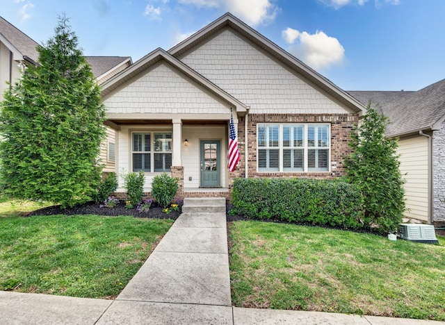 4085 Liberton Way, Nolensville, TN 37135 - view of front facade featuring a front lawn, brick siding, and covered porch