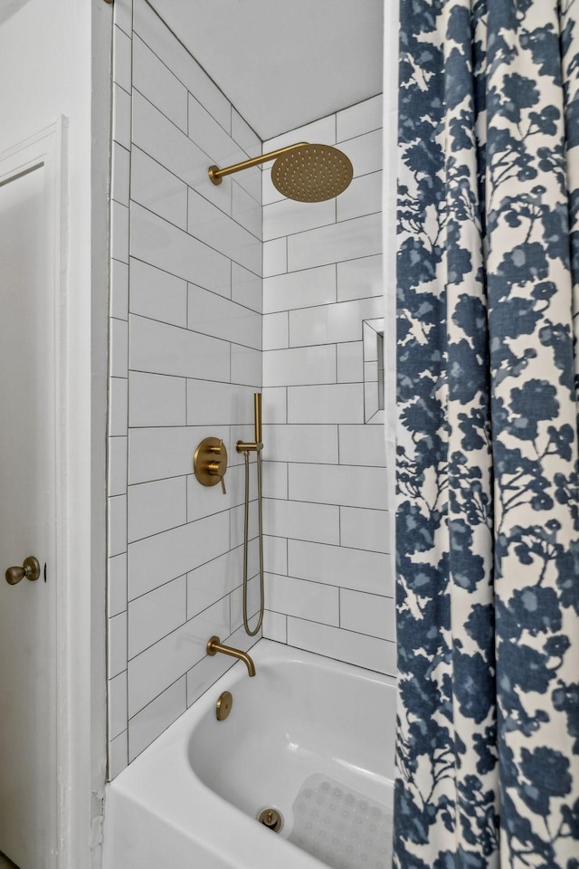 bathroom featuring shower / bath combination with curtain
