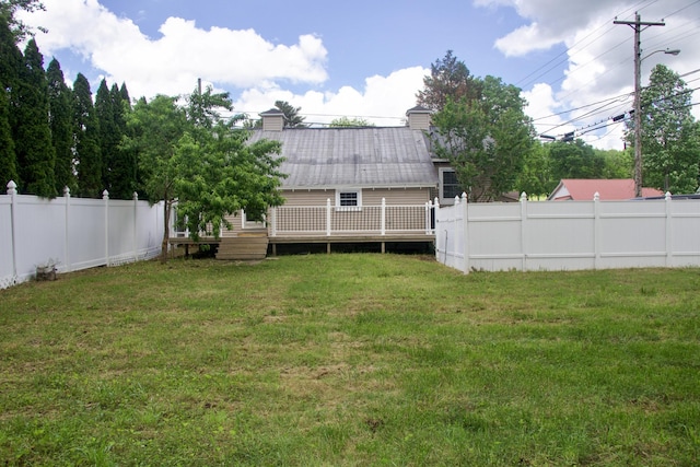 view of yard featuring a deck