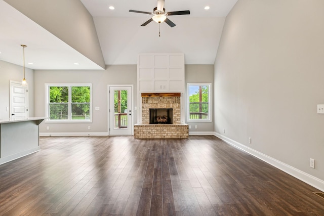7575 Carthage Hwy, Lebanon, TN 37087 - unfurnished living room featuring a ceiling fan, high vaulted ceiling, plenty of natural light, dark wood-style flooring, and recessed lighting