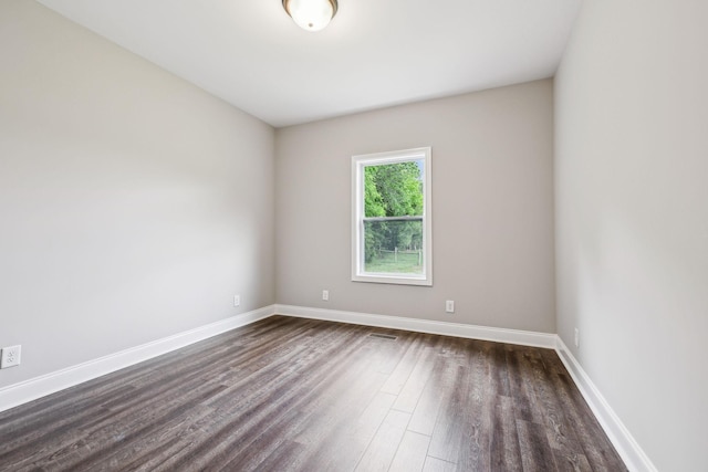 7575 Carthage Hwy, Lebanon, TN 37087 - empty room featuring dark wood-style flooring and baseboards
