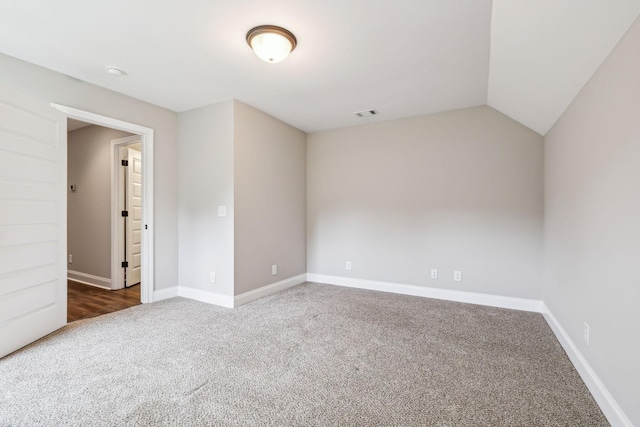 7575 Carthage Hwy, Lebanon, TN 37087 - carpeted empty room with baseboards, lofted ceiling, and a smoke detector