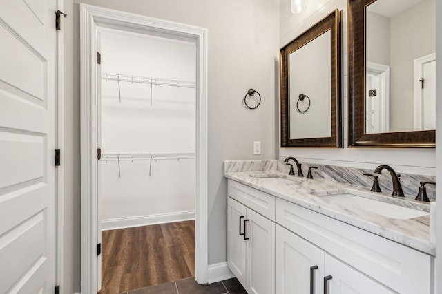 7575 Carthage Hwy, Lebanon, TN 37087 - bathroom with a spacious closet, double vanity, and baseboards