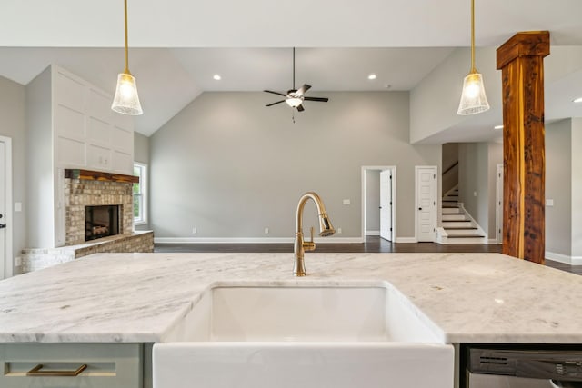 7575 Carthage Hwy, Lebanon, TN 37087 - kitchen featuring open floor plan, stainless steel dishwasher, a sink, high vaulted ceiling, and ceiling fan