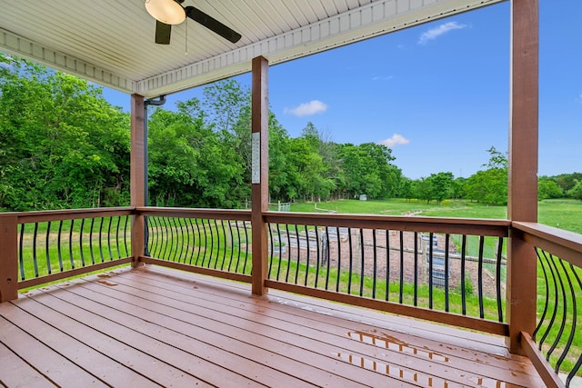 7575 Carthage Hwy, Lebanon, TN 37087 - wooden deck featuring view of wooded area and a ceiling fan