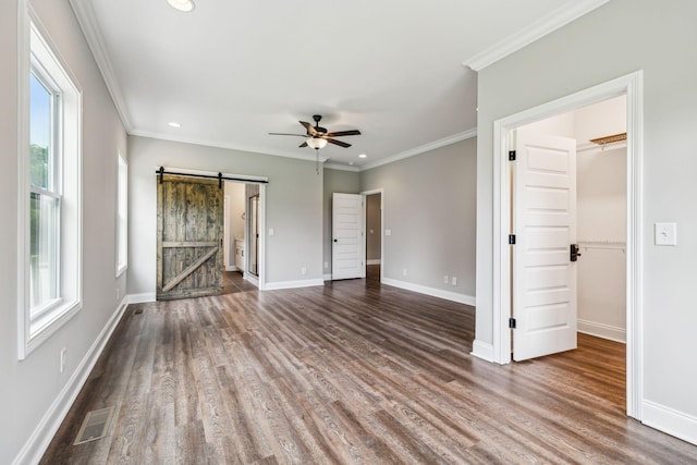 7575 Carthage Hwy, Lebanon, TN 37087 - unfurnished bedroom with a barn door, multiple windows, baseboards, recessed lighting, and crown molding